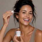 Model applying Skinmoods Nourishing Face Oil on her face