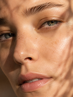 Skinmoods Sunscreen Stick SPF50 Clear  model face in sunlight