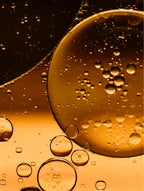 Close up Skinmoods glowing body oil texture