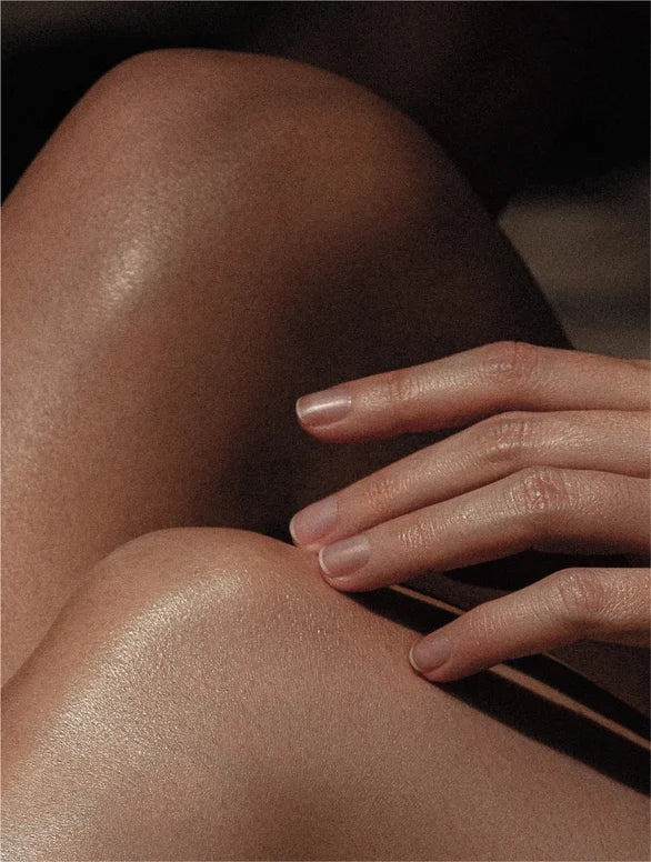 Close up model for the Skinmoods glowing body scrub 